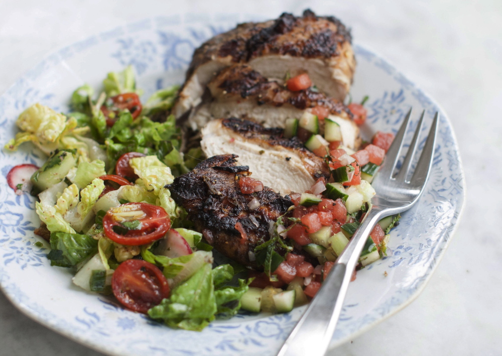 Grilled jerk chicken breast with watermelon salsa is made with a unique blend of seasonings developed in Jamaica.