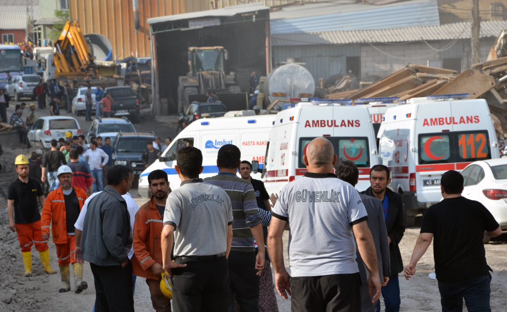 Rescue workers and ambulances at the entrance of the mine after an explosion and fire at a coal mine in Soma, in western Turkey on Tuesday.