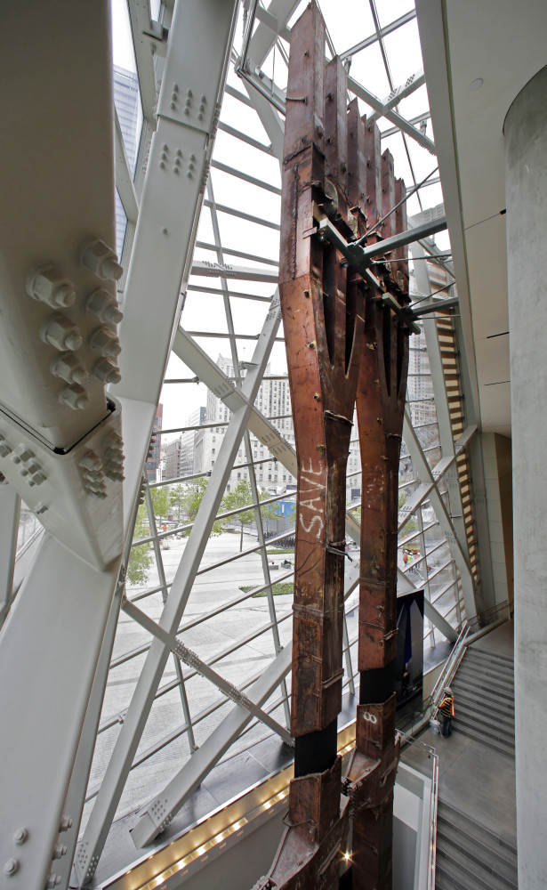 A pair of World Trade Center tridents, that once formed part of the exterior structural support of the east facade of the building, stand in the Sept. 11 Museum, in New York.