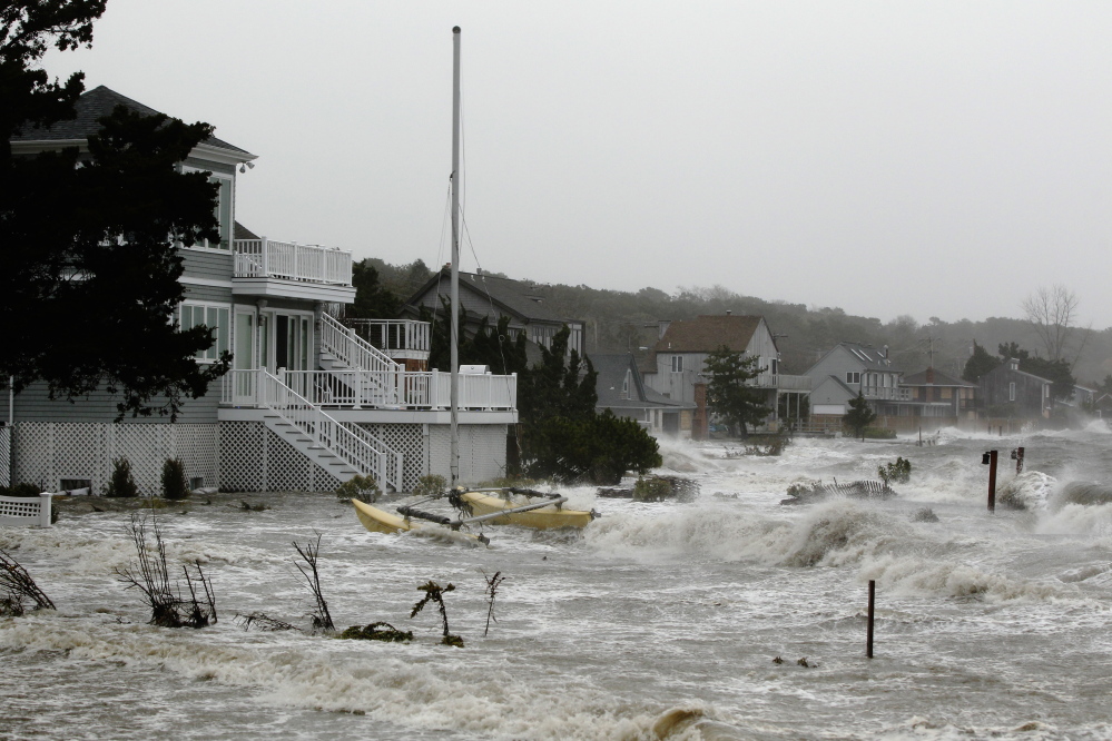 A storm surge from Superstorm Sandy floods homes in Hampton Bays, N.Y., on Oct, 29, 2012. Authors of a new study warn that a shift in storms may have significant implications in regions including the northeastern United States.