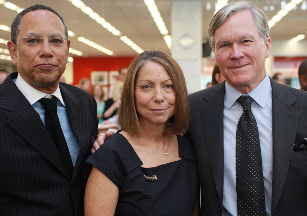 New York Times managing editor Dean Baquet, left, executive editor Jill Abramson and outgoing executive editor Bill Keller pose for a photo at the newspaper in 2011.