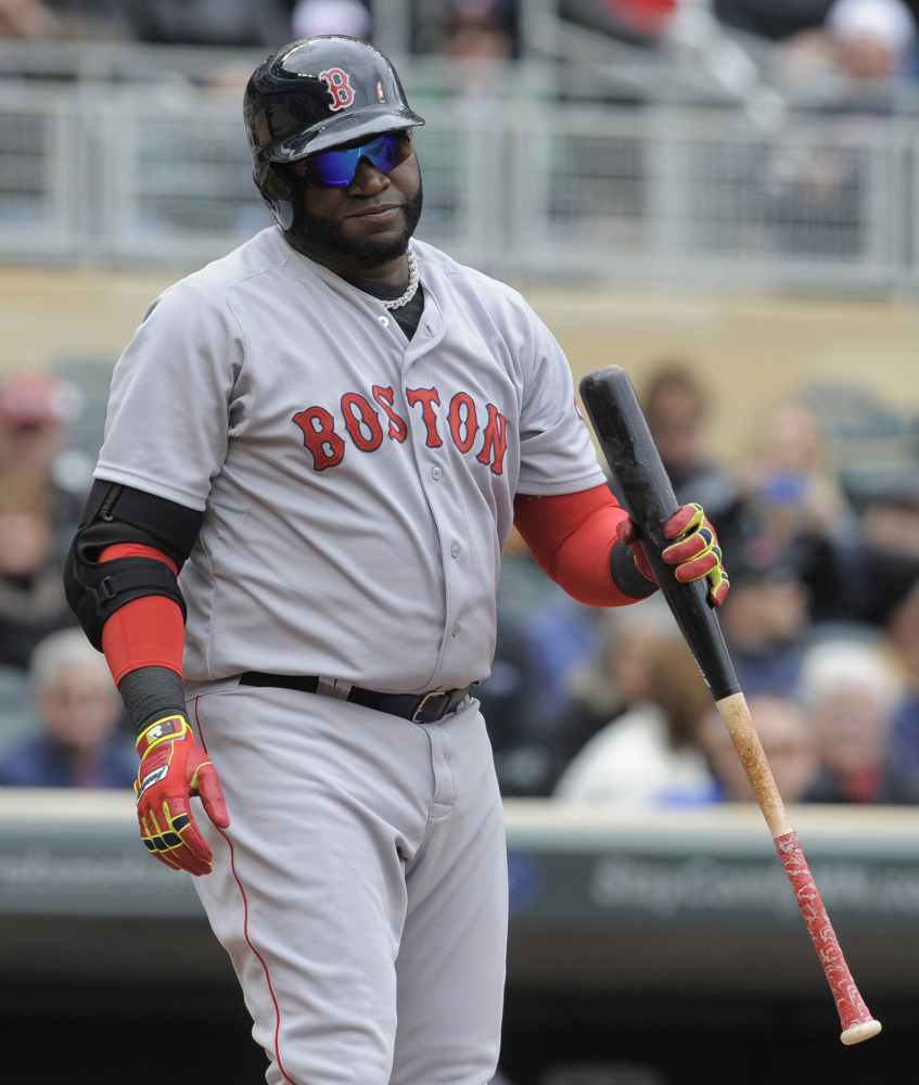 Red Sox designated hitter David Ortiz reacts after being struck out by Twins pitcher Phil Hughes in the fourth inning Thursday.