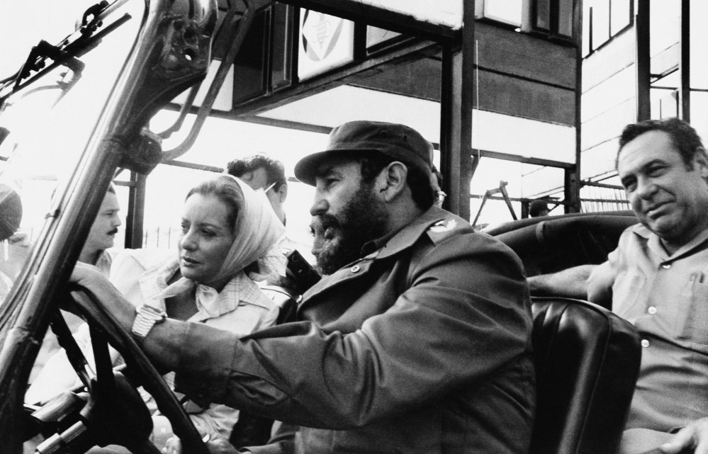 Walters in 1977 being driven by Fidel Castro on a sightseeing tour in Cuba.