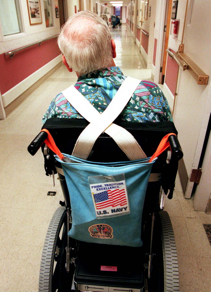 A veteran shows his pride by displaying a flag on his wheelchair. A reader says the average Maine nursing home resident is not a home care candidate.