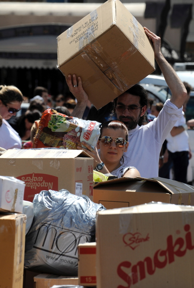 Citizens in Macedonia collect aid such as food, hygienic products, clothing and bottled water intended for the flooded regions in Serbia and Bosnia.