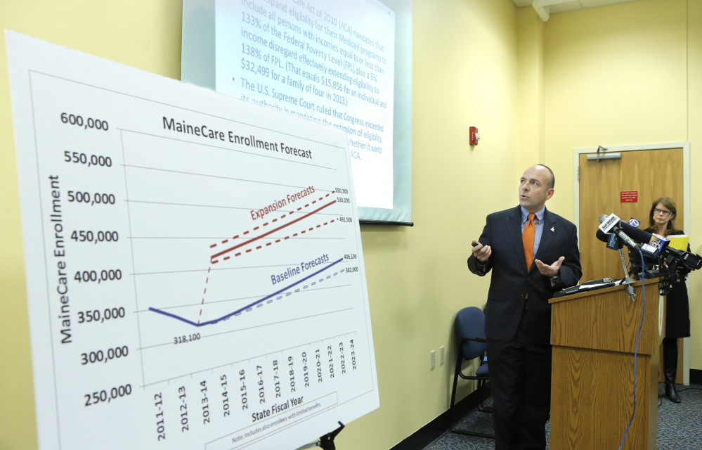 Gary Alexander of the Alexander Group gives his analysis of a report his group developed regarding the cost of expanding MaineCare at the Department of Health and Human Services in Augusta in January.