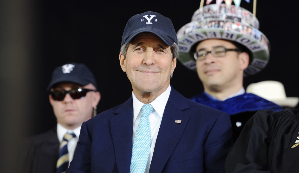 Secretary of State John Kerry smiles while watching Class Day Exercises at Yale University on Sunday.