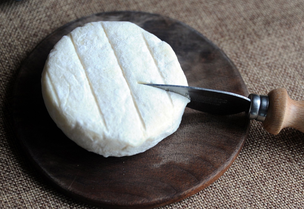 Dragonfly, a white-rind cheese made from cow’s and goat’s milk, is one of the cheeses produced at The Farm at Doe Run.