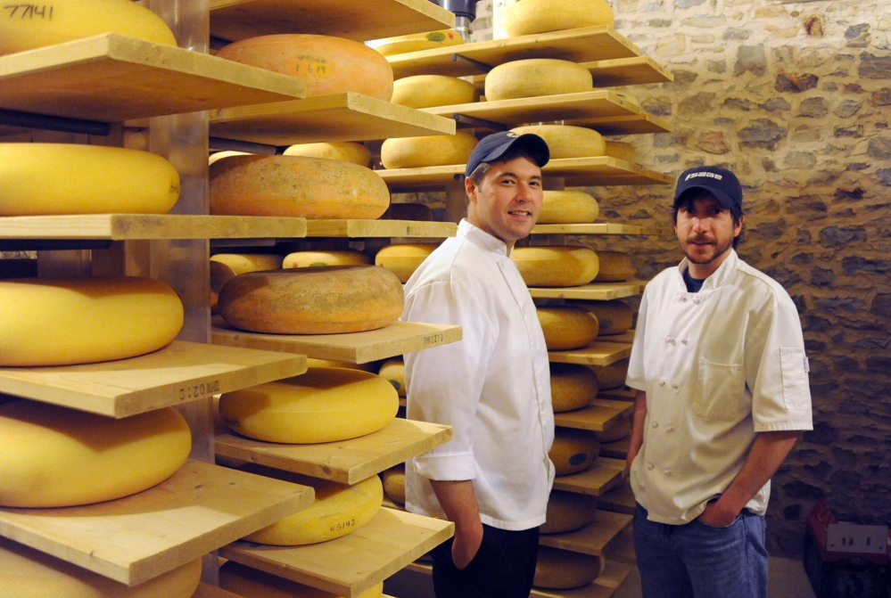 Cheesemakers Sam Kennedy, left, and Matt Hettlinger with some of their products at The Farm at Doe Run in Coatesville, Pennsylvania, outside Philadelphia.