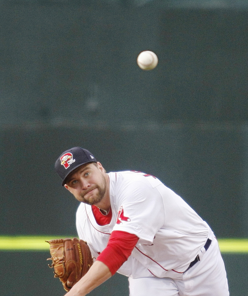 Sea Dogs pitcher Brian Johnson delivers a pitch in the second inning Tuesday night at Hadlock Field. Johnson pitched six innings, allowing one run in a 2-1 win.