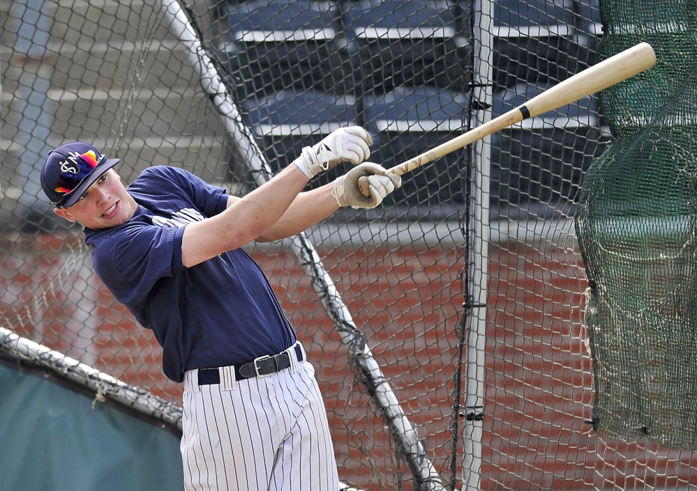 Sam Dexter takes batting practice before heading to the NCAA Division III baseball championships in Appleton, Wisconsin.