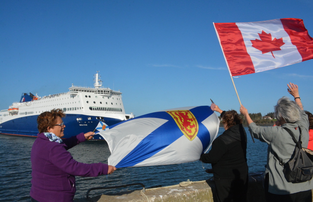 Proud Nova Scotians Louise Zinck, Doreen Rogers and Colette Randell welcome the Nova Star’s arrival on its maiden voyage from Portland.