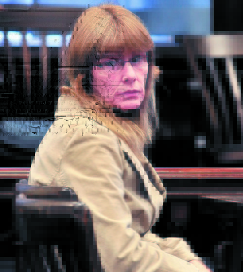 Karen McCaul is shown at the 2010 sentencing hearing in which she was ordered to live at Riverview Psychiatric Center in Augusta.