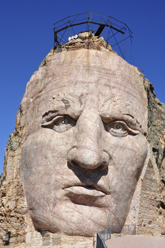 The 87-foot-6-inch tall face of the Crazy Horse mountain carving near Custer, S.D.
