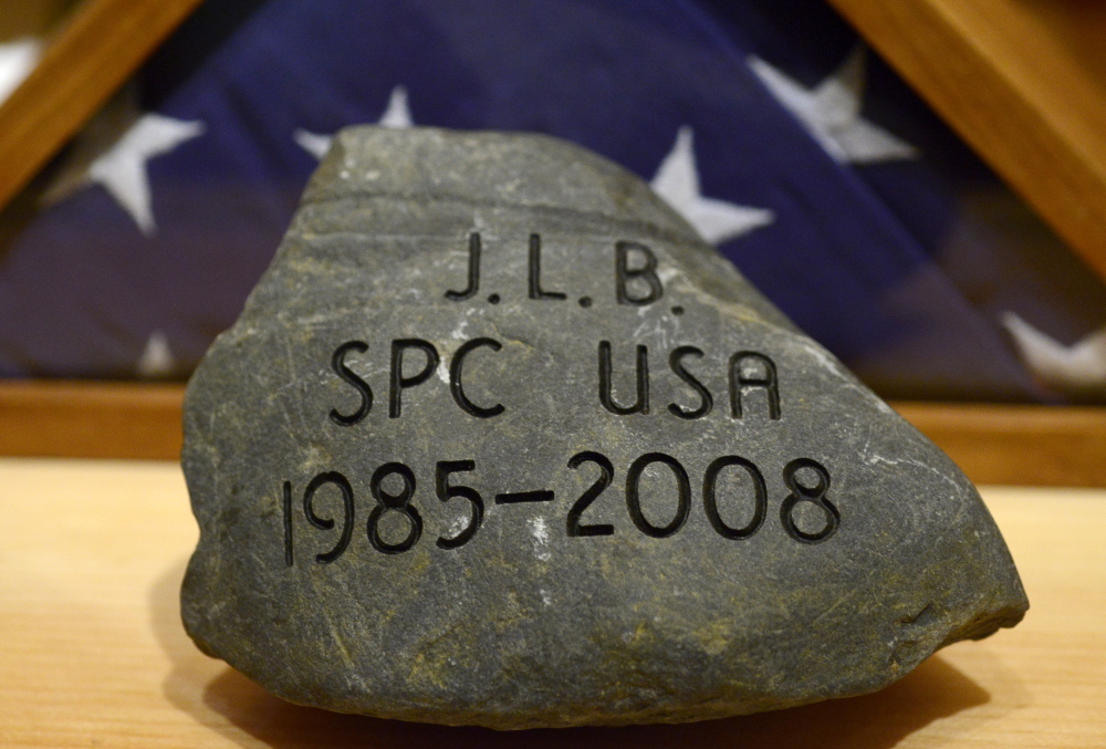 A Chebeague Island stone inscribed in the memory of Spc. Justin Buxbaum, who was 23 when he died in an accidental shooting in Afghanistan in 2008, will be among those carried up Owl Mountain this weekend as part of The Summit Project.