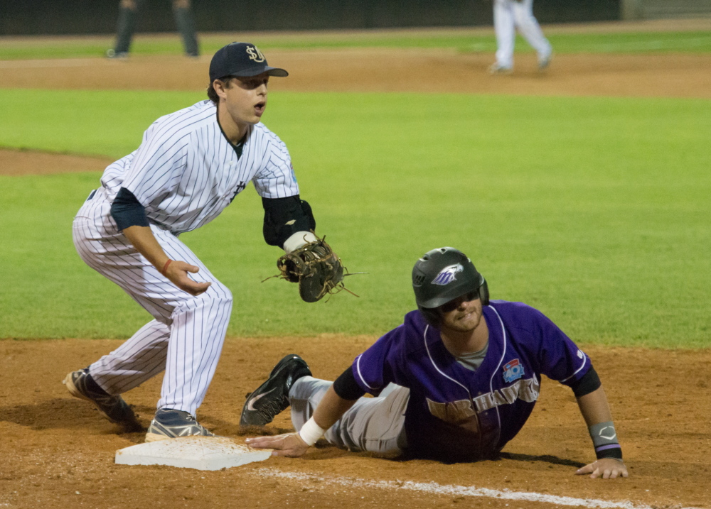 University of Southern Maine first baseman John Carey looks for a call Friday night after Mikole Pierce of Wisconsin-Whitewater made it back to the bag on an attempted pickoff. USM lost 8-1 and will face Salisbury, Md., in an elimination game at 2:15 p.m. Saturday.