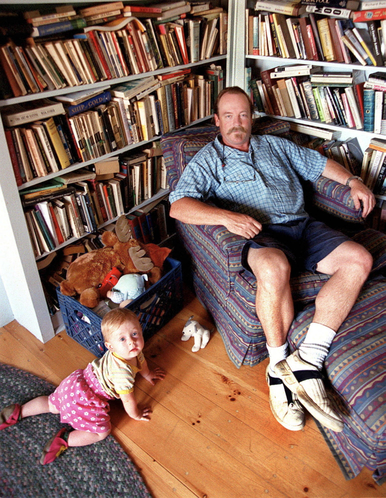 Author Bill Roorbach in 2001 with his daughter, Elysia Pearl, who is now a 13-year-old writer and Maine Literary Award nominee, at home in West Farmington