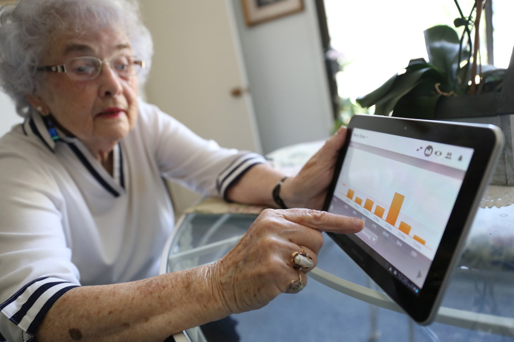 Mary Ellen Snodgrass of Redwood City, Calif., describes how the smart pills that she takes daily send information that she can see on her tablet, such as the number of steps she takes in a day or how much time she spends sitting.
