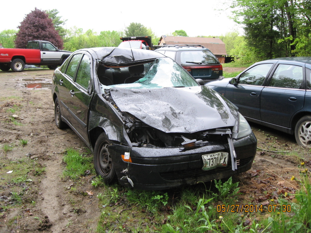 Three people escaped injury Saturday when a 2003 Ford Sedan struck a cow on Main Street in Readfield.