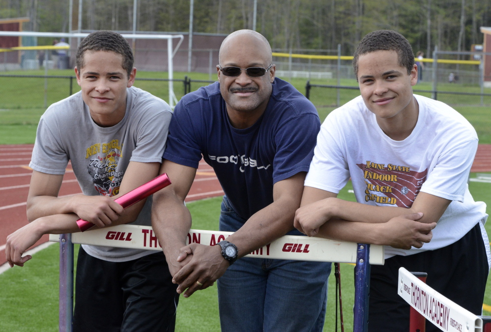 Twins Dylan, left, and Andrew Smith are receiving top-notch coaching while competing for the Thornton Academy track team. Their father, Carl Smith, was a superior athlete in high school and at UMaine, and is an assistant at Thornton. John Patriquin/ Staff Photographer