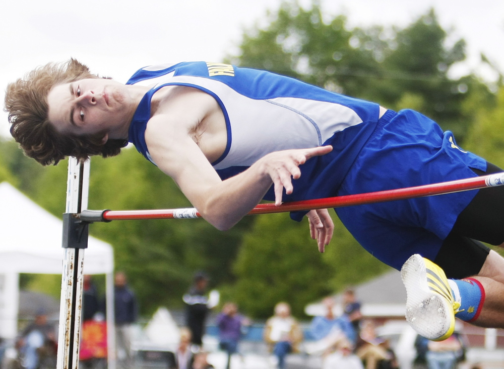 Tony St. Angelo of Falmouth clears 6 feet in the high jump in the Western Maine Conference track and field championships at Lake Region High. St. Angelo finished second behind Kennebunkâs Austin Wiegle (6-2).