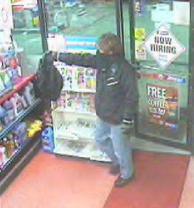 This photo taken from surveillance video shows one of the robbery suspects entering the Xtramart at 28 Elm St., Saco, Wednesday night. Provided by the Saco Police Department