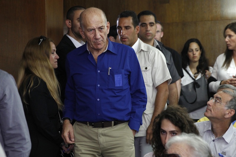 Israel's former Prime Minister Ehud Olmert appears at the Tel Aviv District Court in Israel on Tuesday. He was sentenced to six years in prison for his role in wide-ranging bribery case, capping a stunning fall from grace for one of the most powerful men in the country.