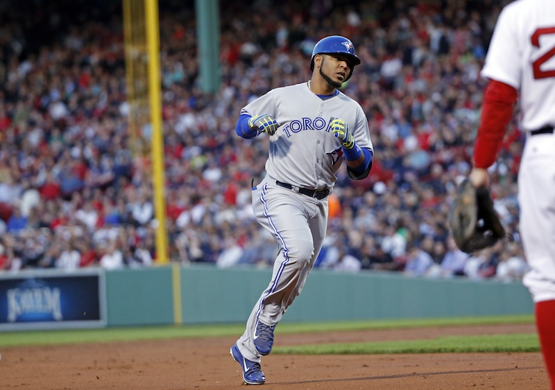 Toronto Blue Jays' Edwin Encarnacion runs the bases after hitting a two-run homer in the third inning of a baseball game against the Boston Red Sox at Fenway Park in Boston, Tuesday, May 20, 2014. Fenway Park