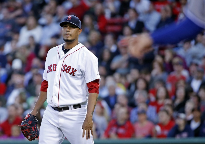 Boston Red Sox starting pitcher Felix Doubront watches a two-run homer by Toronto Blue Jays' Edwin Encarnacion stay fair in the third inning of a baseball game at Fenway Park in Boston, Tuesday, May 20, 2014. Fenway Park