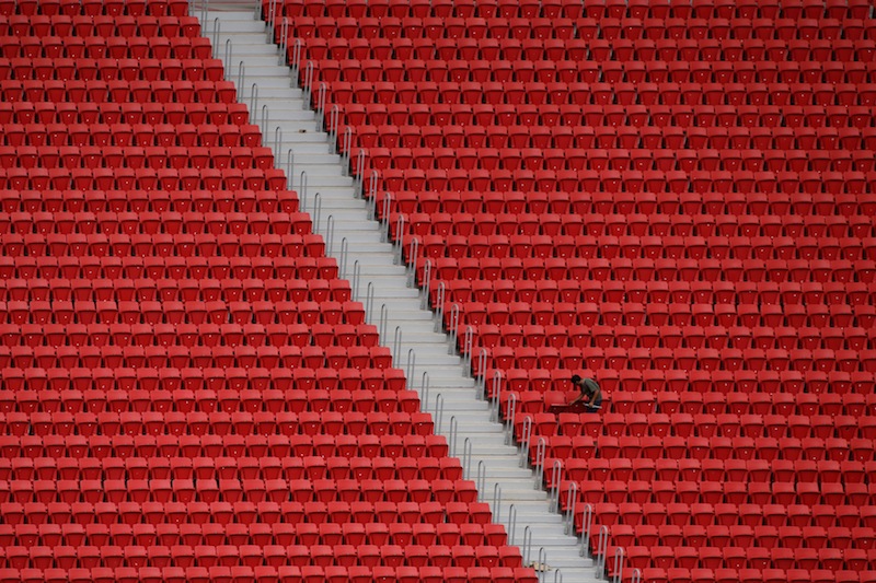 A worker is seen April 8 at the the Mane Garrincha stadium, in Brasilia.