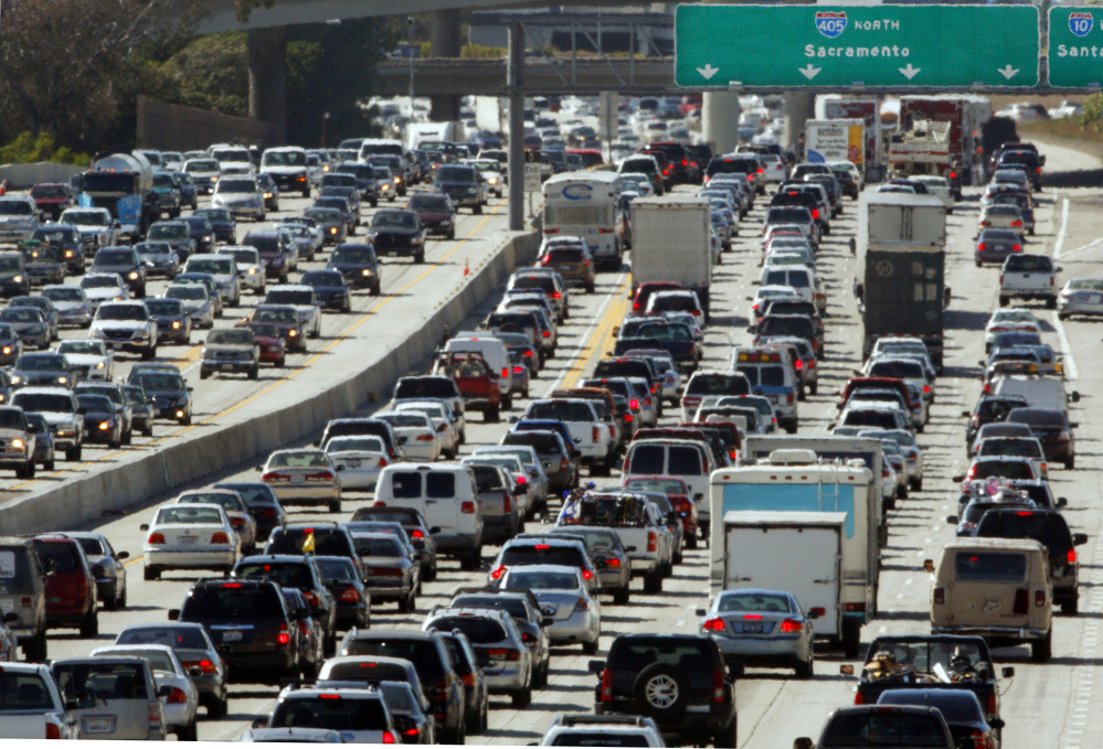 Traffic is jammed in both directions on Interstate 405 on the west side of Los Angeles, in May 2010. Driving conditions like this may be one of the factors contributing to the fact that Americansâ trips on mass transit are up 37 percent since 1995. The Associated Press