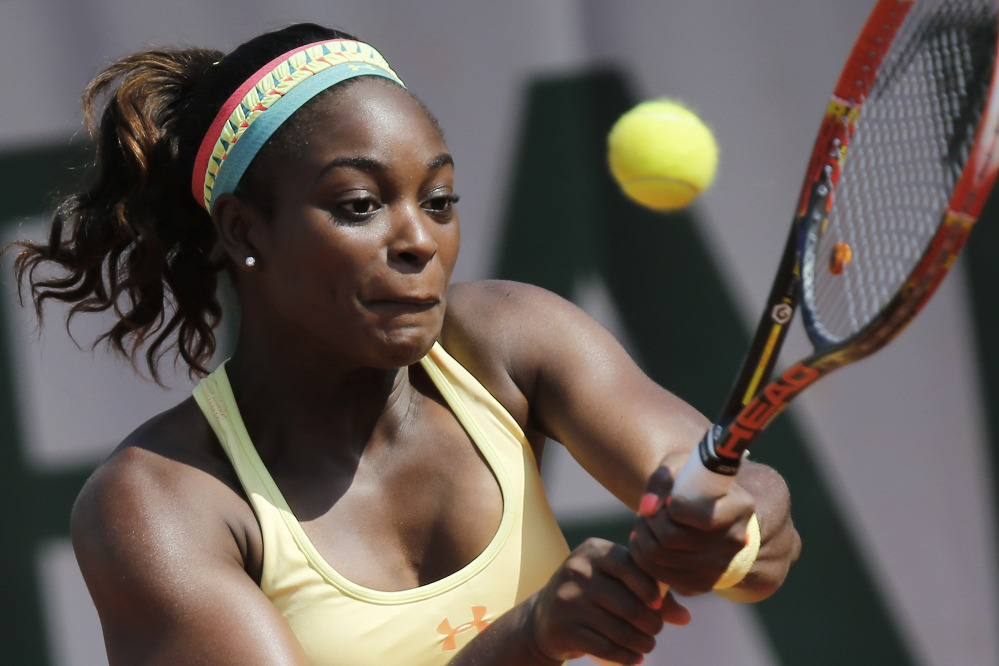 Sloane Stephens of the U.S. returns the ball during the third-round match of the French Open against Russiaâs Ekaterina Makarova at the Roland Garros stadium, in Paris on Saturday. Stephens won in two sets 6-3, 6-4. The Associated Press