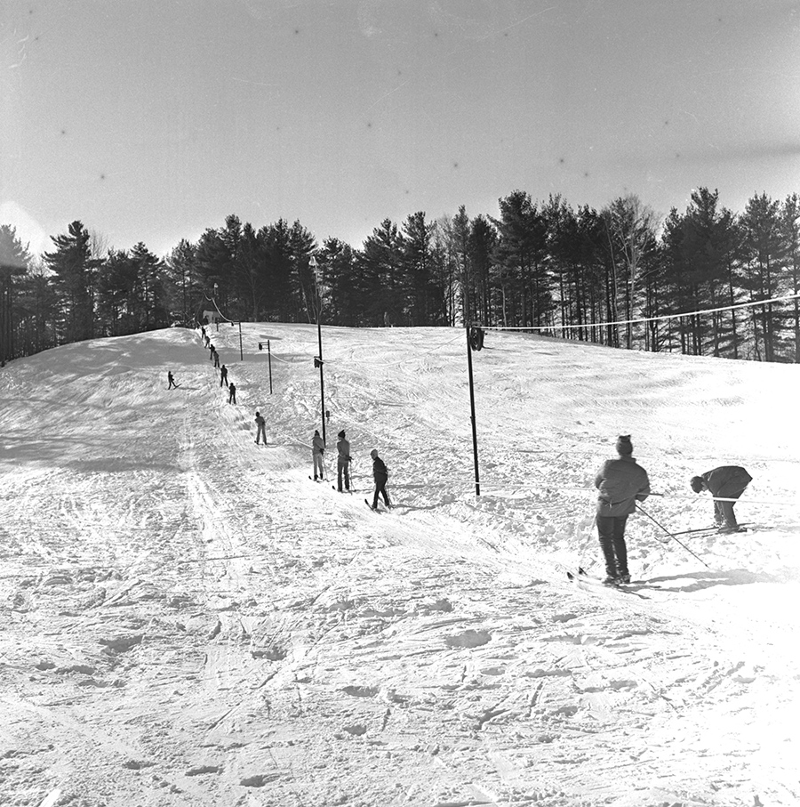 A sunny day in December 1970 at the Gorham Community Ski Tow, located off Water Street in Gorham village. Originally published in the Dec. 31, 1970 Portland Evening Express. Courtesy of Portland Public Library Special Collections & Archives.
