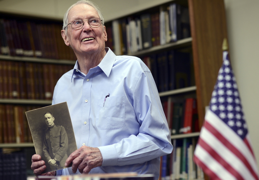 Vincent Radel Keating, of Fairfield, Conn., holds a photo of his father Vincent Leo Keating â who chronicled his experiences during World War I â in Bridgeport, Conn. Photos by Autumn Driscoll/Connecticut Post
