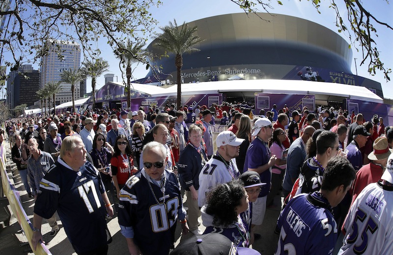 Fans line up to enter the Superdome in New Orleans before Super Bowl XLVII between the San Francisco 49ers and the Baltimore Ravens. NFL owners will vote Tuesday on the site of the 2018 Super Bowl, choosing among New Orleans, Indianapolis and Minneapolis.