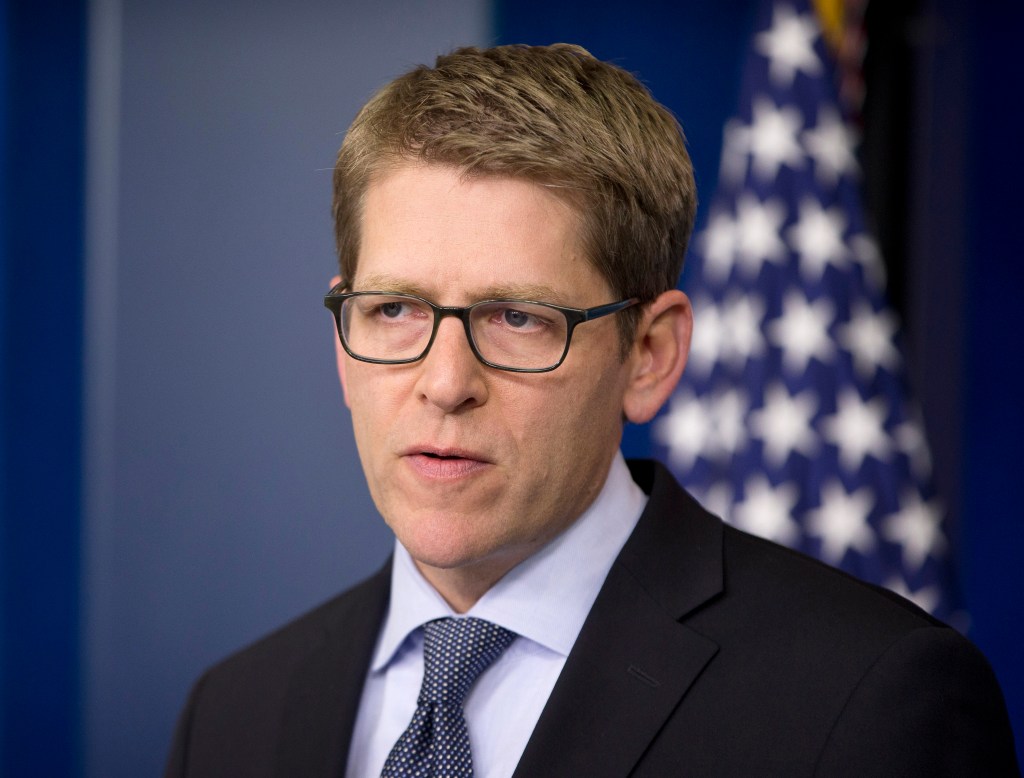 White House Press Secretary Jay Carney listens during his daily news briefing at the White House in Washington on May 19, 2014.  Carney is leaving his post and his No. 2 is taking over.  President Barack Obama said principal deputy press secretary Josh Earnest will take over the job. 