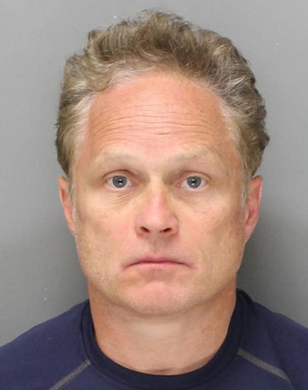 In this undated photo provided by the Philadelphia Police Department, Gary Dudek, 54, of Wallingford, Pa., is shown. Dudek, a former medical company sales representative was arrested in Monday, May 26, 2014 and charged charged with stealing more than $350,000 worth of human skin over a period of several years.