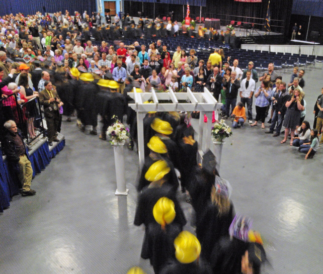 Graduates file into their Kennebec Valley Community College graduation on May 17 at the Augusta Civic Center.