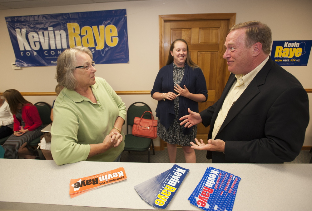Republican primary candidate Kevin Raye talks with campaign volunteers as they wait for results to come in on the evening of June 10. Kevin Bennett Photo
