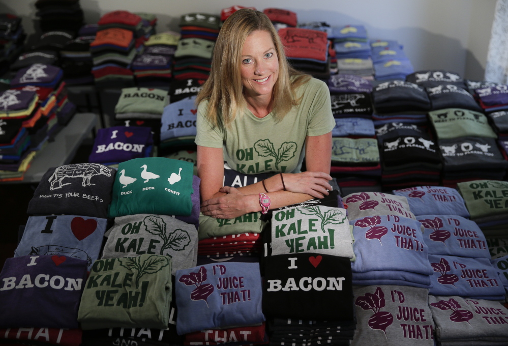 Cyndi Grasman owns Bad Pickle Tees in Valley Center, Calif. Entrepreneurs say websites boost sales, cut down on time-consuming calls and lure more people into their stores. The Associated Press 