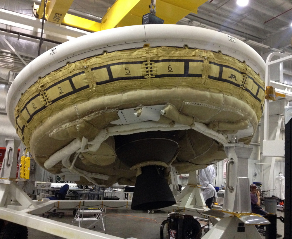 NASAâs saucer-like test vehicle for landing large payloads on Mars is shown at the U.S Navyâs Pacific Missile Range Facility at Kekaha on the island of Kauai in Hawaii. The Associated Press