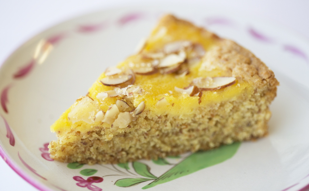 When life – or a generous colleague – gives you lots of eggs, try this lemon curd almond cake. Yoon S. Byun/Staff Photographer