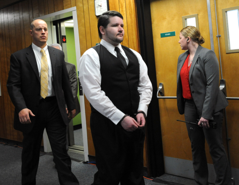 Seth Mazzaglia is escorted into the courtroom at Strafford County Superior Court in Dover, N.H., on Friday. He is charged with first-degree murder in the October 2012 slaying of 19-year-old Elizabeth “Lizzi” Marriott of Westborough, Mass.

The Associated Press 