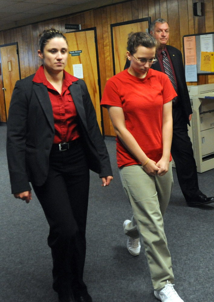 The Associated Press Kathryn McDonough is escorted into the courtroom in the trial of Seth Mazzaglia at Strafford County Superior Court in Dover, N.H., on Friday.