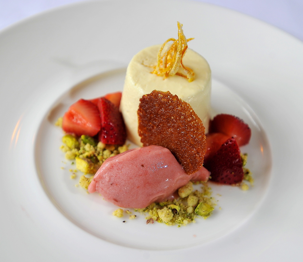 Ginger Bavarian mousse with strawberries, pistachio cookie crumble and rhubarb sorbet. Gordon Chibroski/Staff Photographer