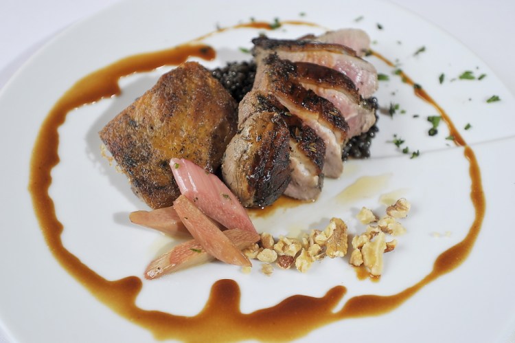 Lavender-marinated duck breast, with duck leg confit, lentils du Puy, walnuts and sous vide rhubarb. 