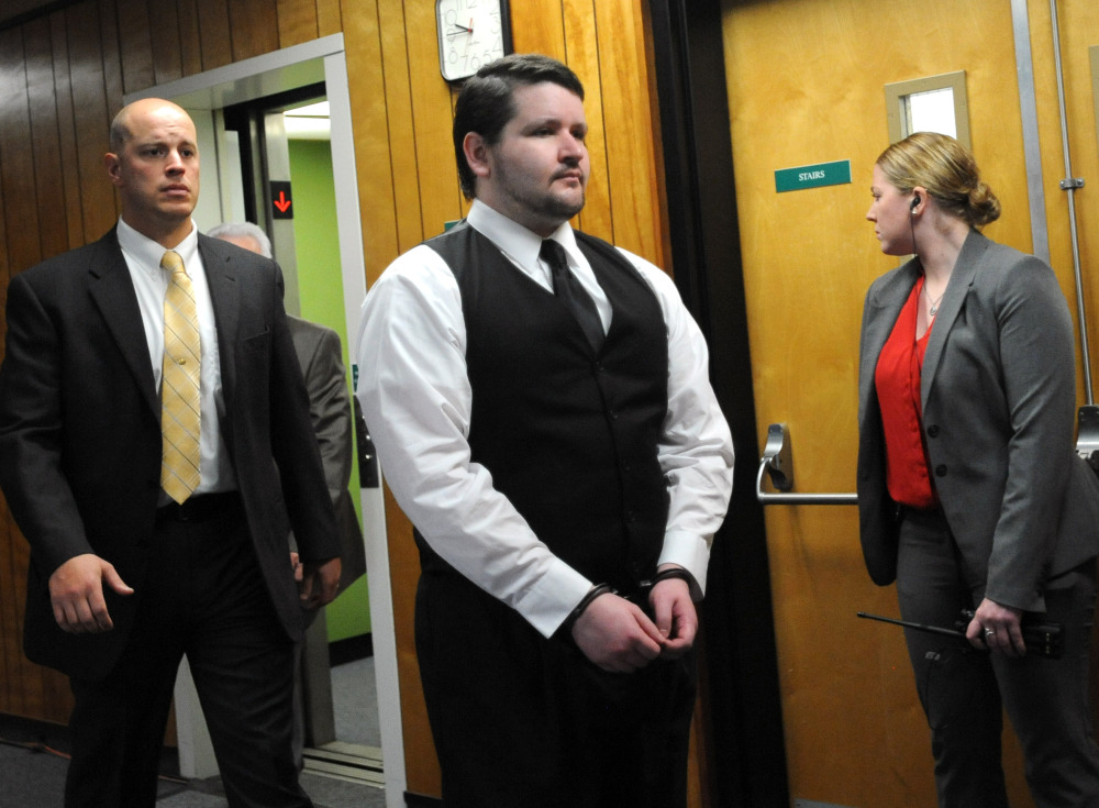 Seth Mazzaglia of Dover, N.H., is escorted into the courtroom at Strafford County Superior Court in Dover on Friday, He is charged with first-degree murder in the death of 19-year-old Elizabeth “Lizzi” Marriott of Westborough, Mass. The Associated Press 