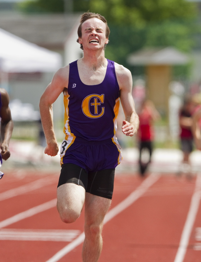  Jake Dixon heads toward the finish line to win the 400 meters Saturday at the Class A track and field state championships, helping Cheverus win the team title. Carl D. Walsh/Staff Photographer