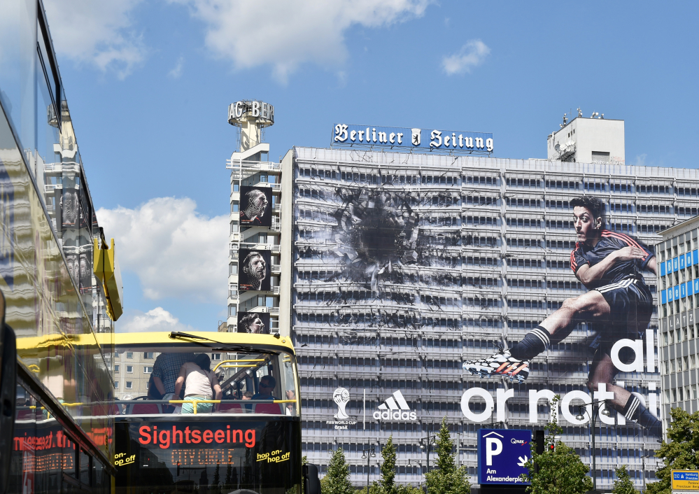 The Associated Press Sportswear manufacturer Adidas has put up an advertisement on the entire facade of a building in Berlin before the World Cup. The company has concerns over FIFA corruption claims.