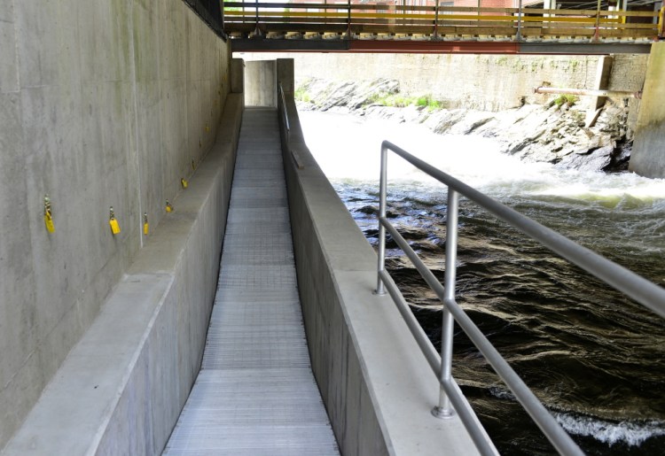 Photos by Logan Werlinger/Staff Photographer Sappi Fine Paper in Westbrook, ordered in 2009 to build a fish passage by Inland Fisheries and Wildlife, completed the structure at Cumberland Mills Dam in April of last year.